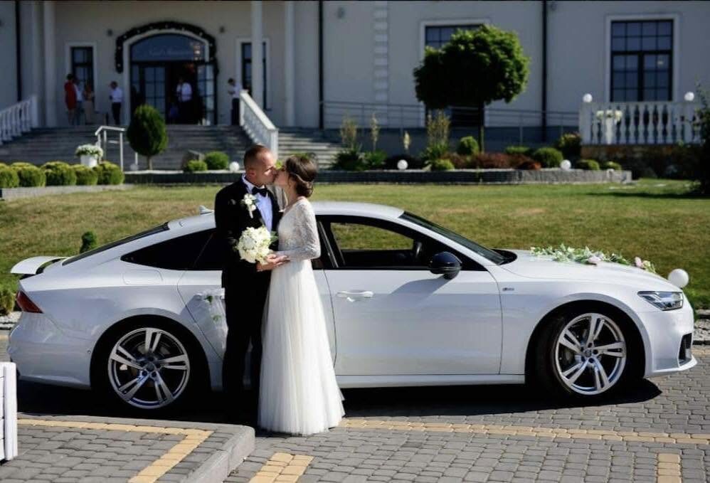 Para młoda przy Audi A7 S-line — Stach VIP